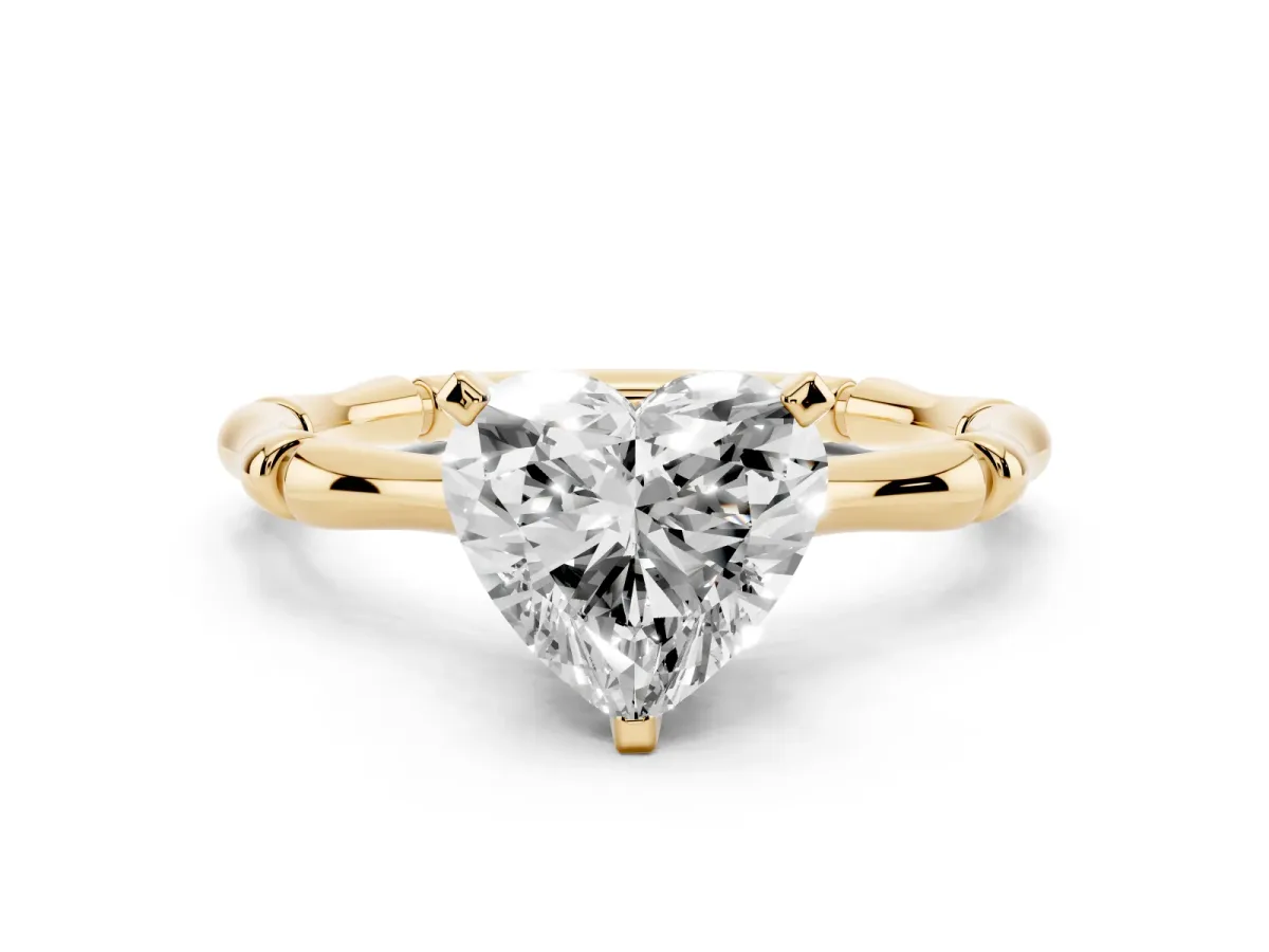 Heart Cut Solitaire Diamond Ring with Bamboo Band and Four-Prong Setting Yellow gold