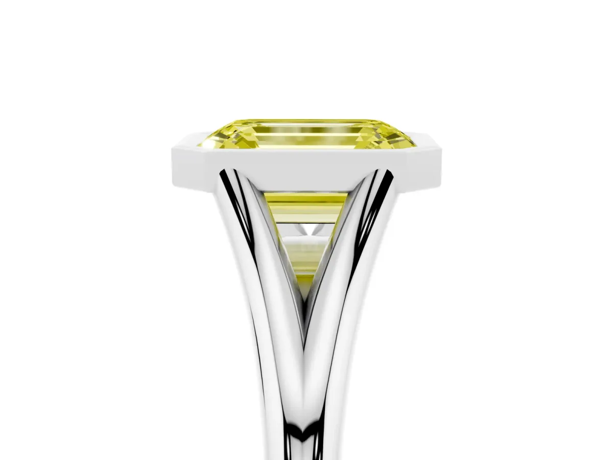 Fancy Yellow Bezel Set Emerald Cut Cut Solitaire Ring with Tapered Band Platinum