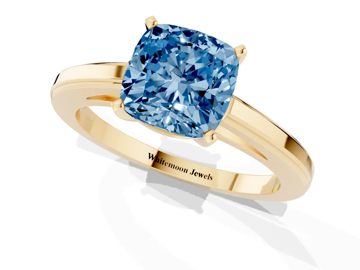 Fancy Blue Cushion Cut Solitaire Diamond Ring with Four-Prong Setting and Classic Band Yellow gold