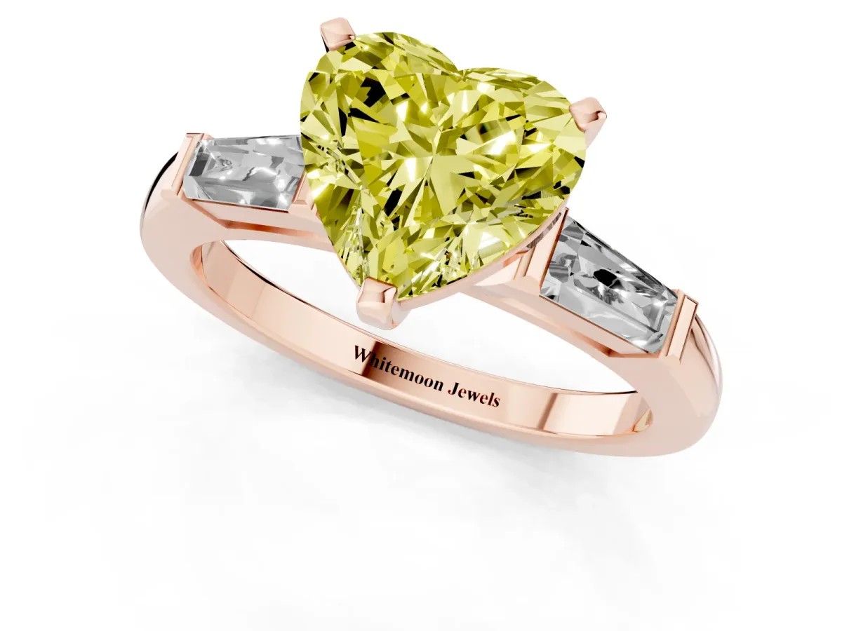 Fancy Yellow Heart Cut Solitaire with Tapered Baguette Side Stones on a Classic Band with Four-Prong Setting Rose gold