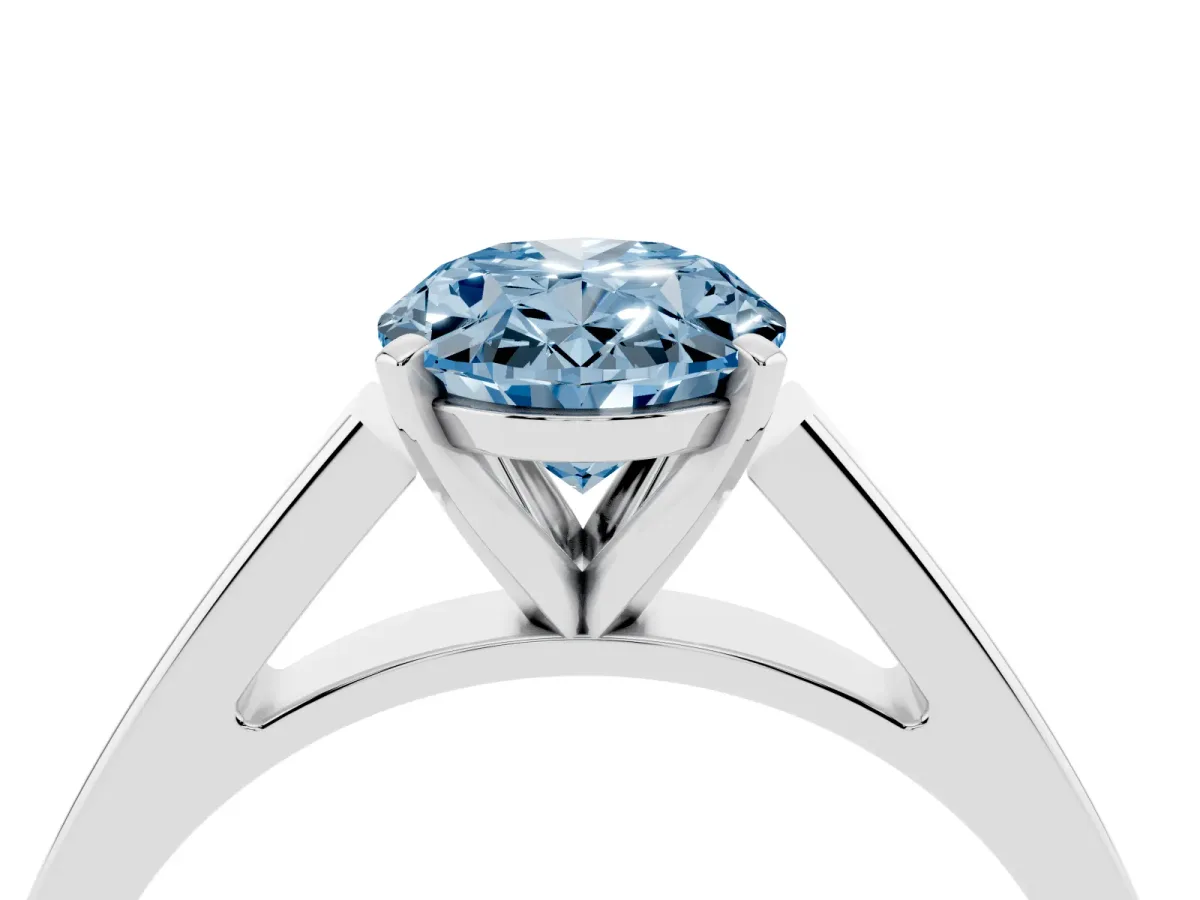 Fancy Blue Oval Cut Solitaire Engagement Ring with Four-Prong Setting and Tapered Band Silver