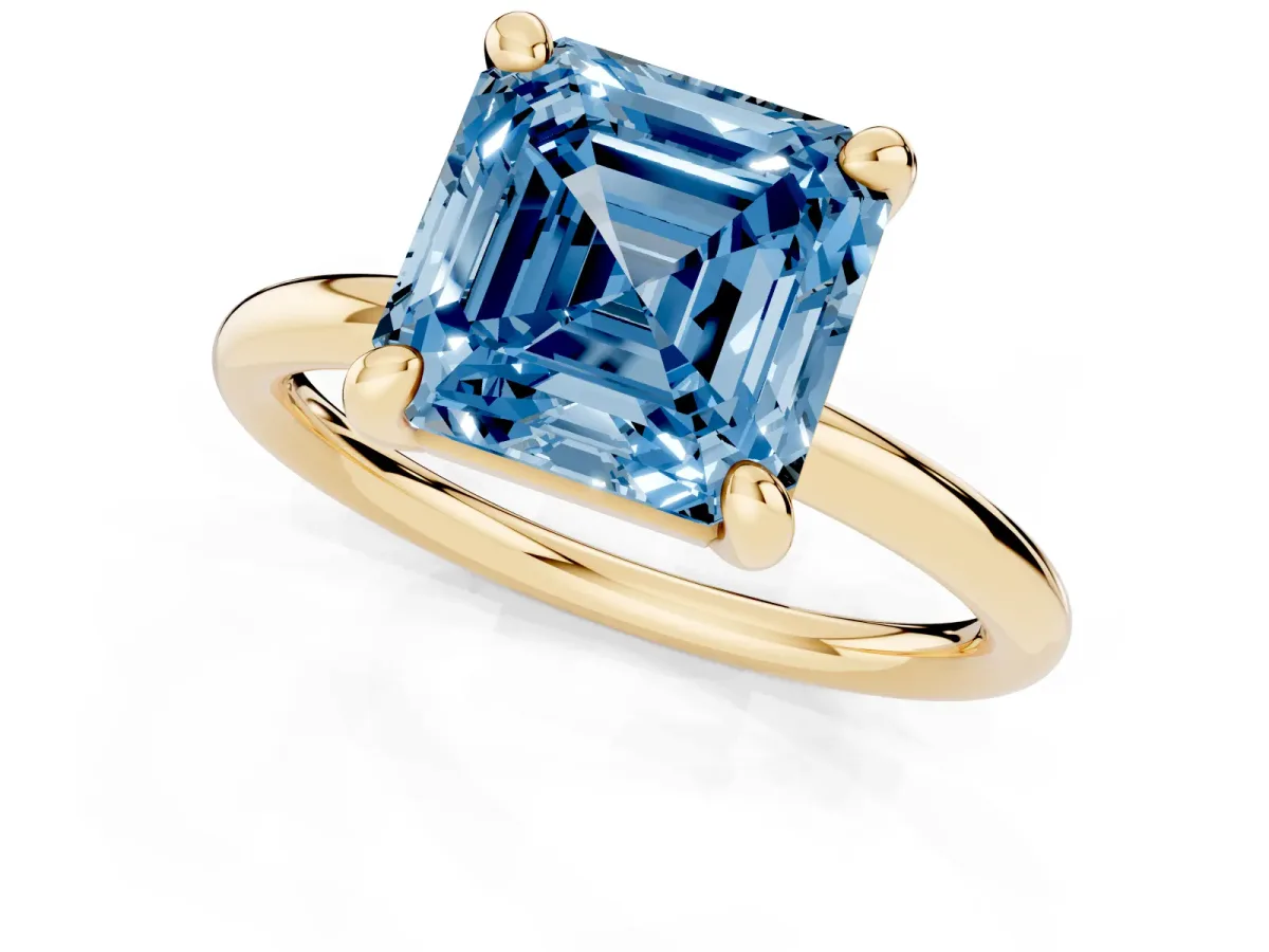 Fancy Blue Asscher Cut Solitaire Diamond Ring with Four-Prong Setting on a Plain Band Yellow gold