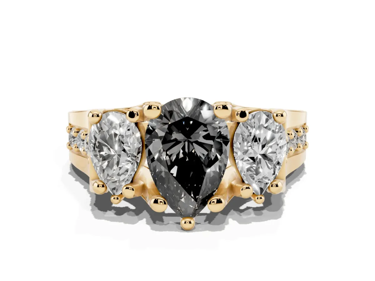 Fancy Black Pear Cut Diamond Three-Stone Ring with Channel Set Band and Four-Prong Setting Yellow gold