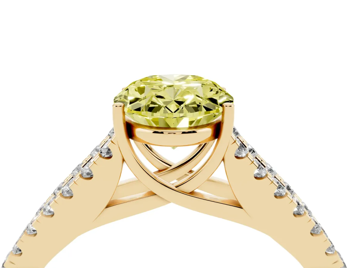 Fancy Yellow Oval Cut Diamond Split Shank Pavé Engagement Ring with Four-Prong Setting Yellow gold