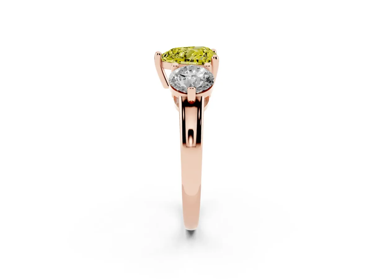 Fancy Yellow Three-Stone Heart Cut Brilliant Cut Solitaire Ring with Prong Setting on a Classic Band Rose gold