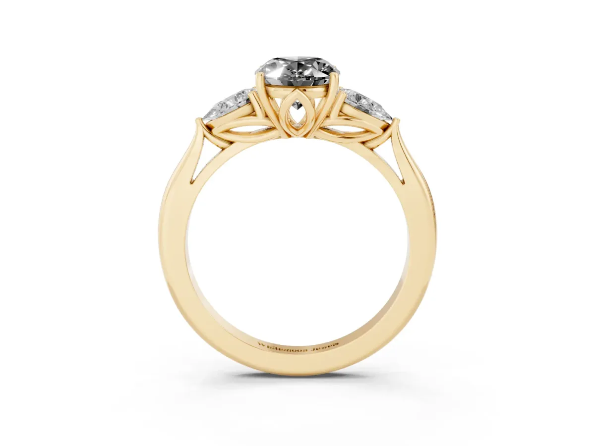 Fancy Black Oval Cut Diamond Three-Stone Ring with Pear Side Stones and Prong Setting Yellow gold