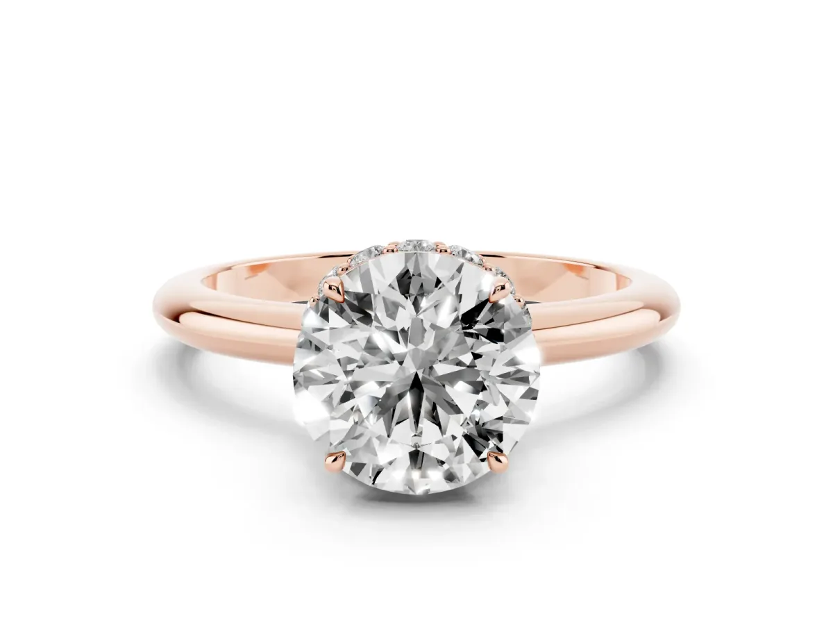 Round Cut Brilliant Solitaire Engagement Ring with Six-Prong Setting and Classic Band Rose gold