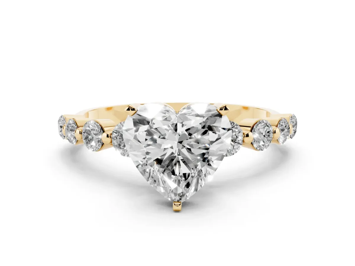 Heart Cut Solitaire Diamond Ring with Pave Band and Four-Prong Setting Yellow gold