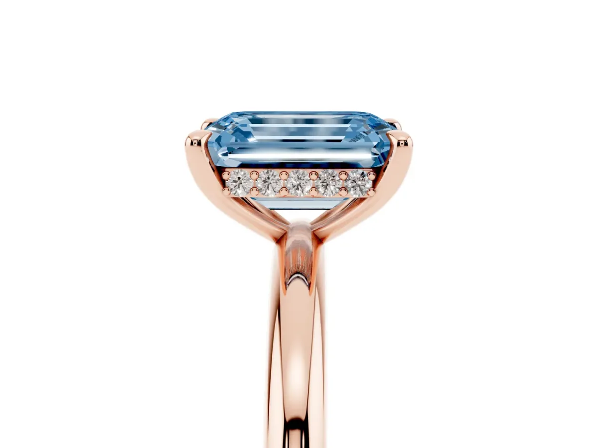 Fancy Blue Emerald Cut Diamond Solitaire Ring with Thin Band and Four-Prong Setting Rose gold