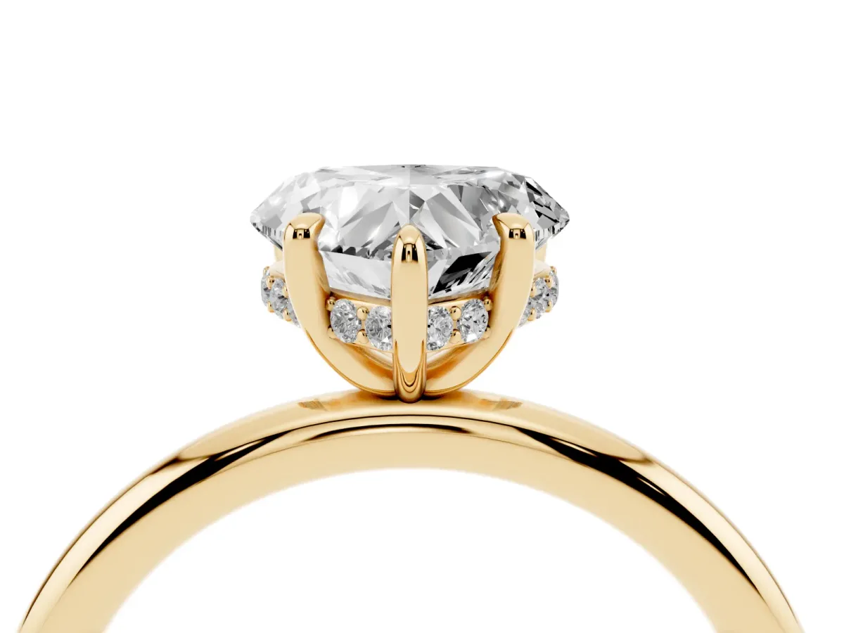 Heart Cut Diamond Solitaire Ring with Thin Band and Four-Prong Setting Yellow gold
