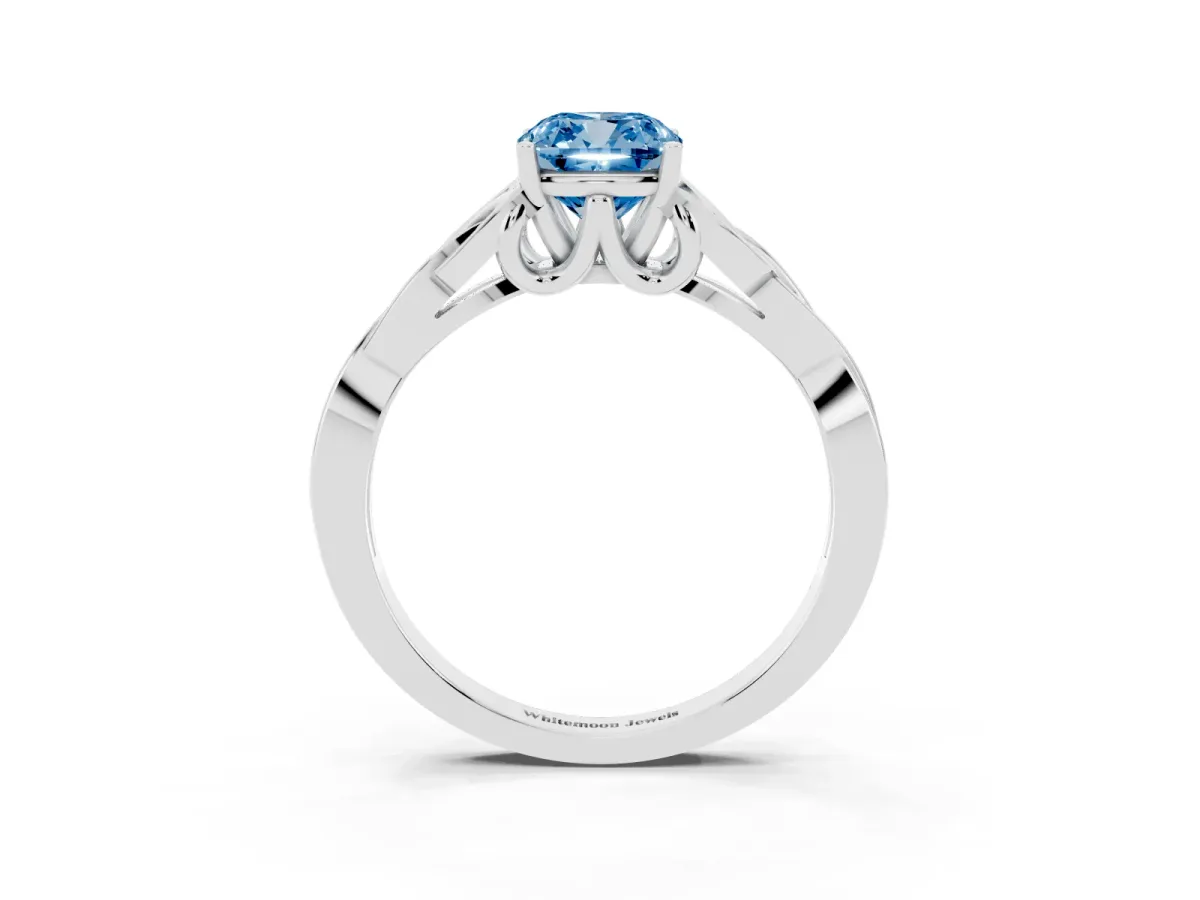 Fancy Blue Cushion Cut Diamond Solitaire Engagement Ring with Celtic Knot Band and Four-Prong Setting Silver