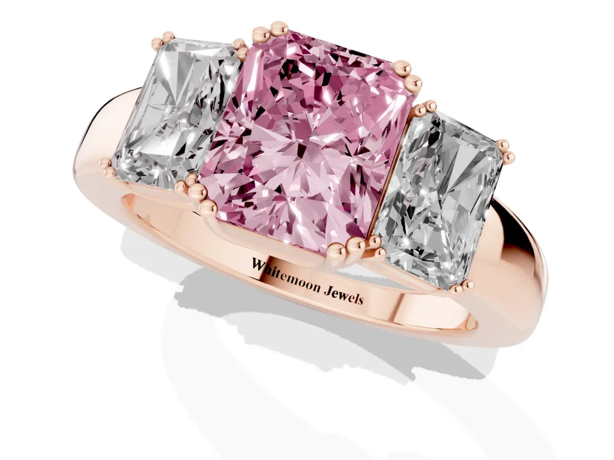 Fancy Pink Three-Stone Radiant Cut Cut Diamond Ring with Channel Set Band and Four-Prong Setting Rose gold