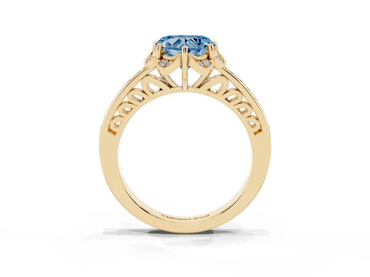 Fancy Blue Heart Cut Cut Halo Diamond Ring with Channel Set Band and Four-Prong Setting Yellow gold