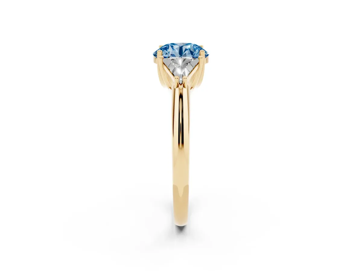 Fancy Blue Three-Stone Round Cut Diamond Engagement Ring with Trillion Side Stones and Prong Setting Yellow gold