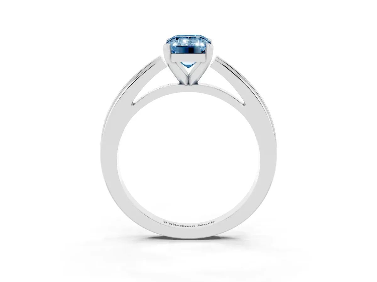 Fancy Blue Emerald Cut Solitaire Diamond Ring with Four-Prong Setting and Classic Band Platinum