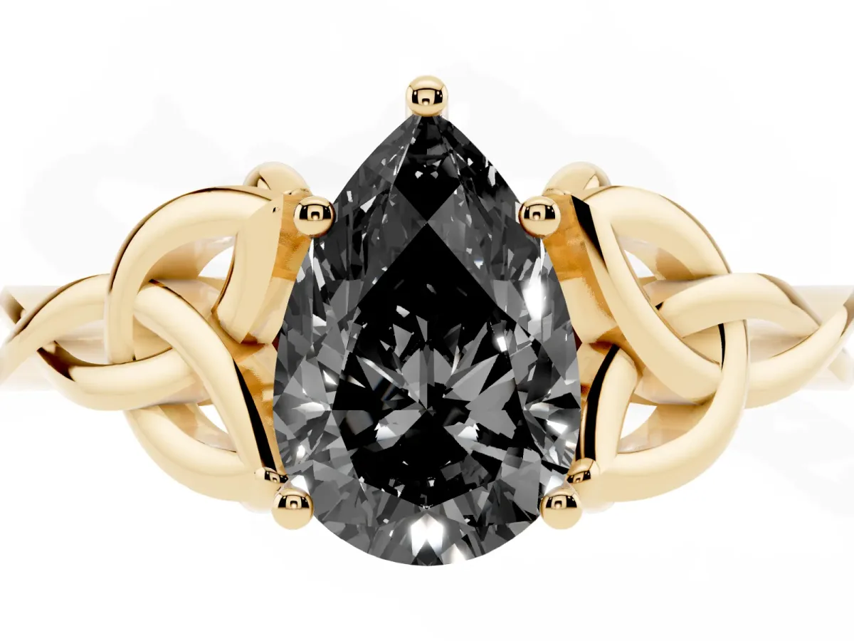 Fancy Black Pear Cut Diamond Solitaire Engagement Ring with Celtic Knot Band and Four-Prong Setting Yellow gold