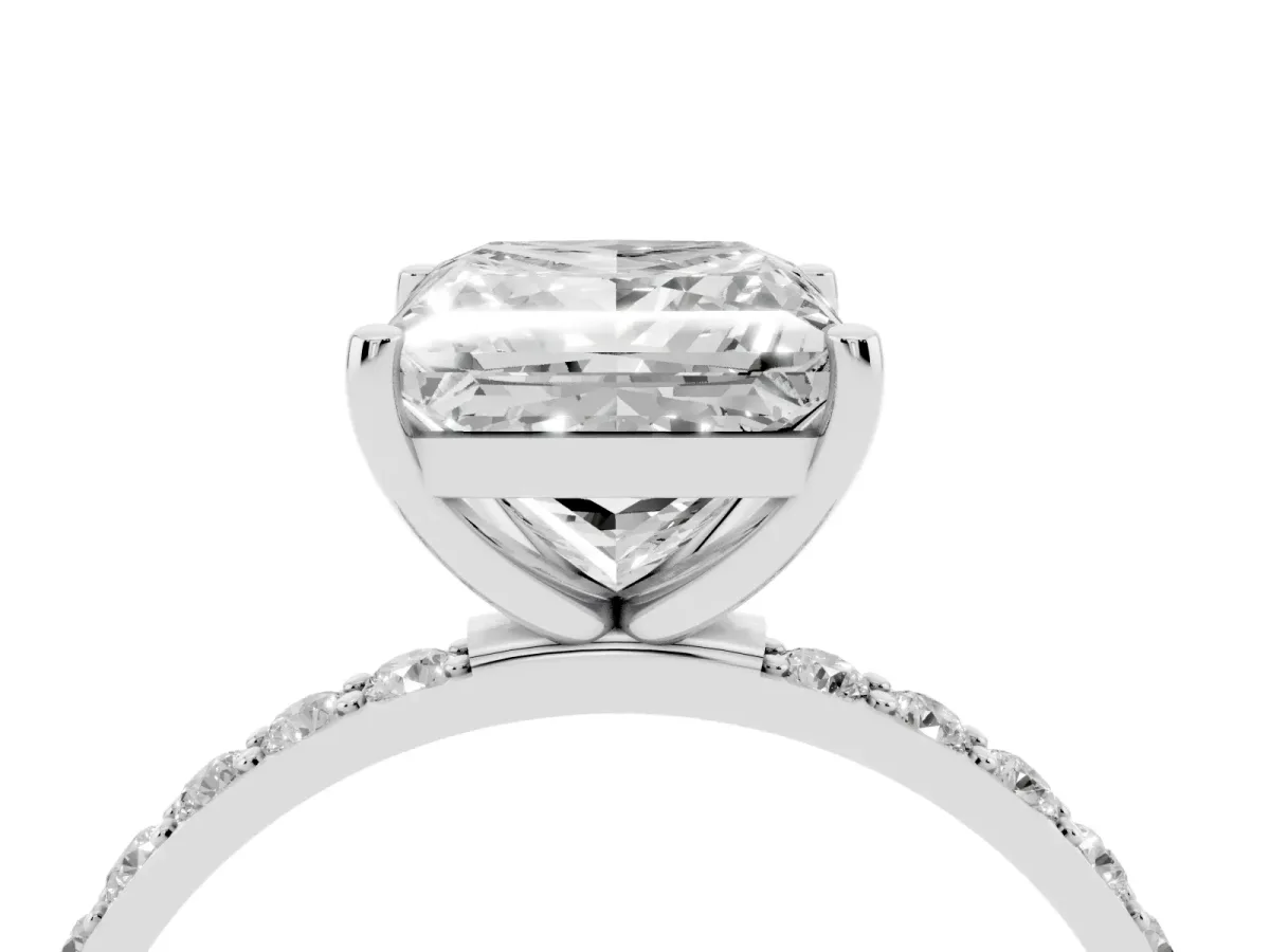 Princess Cut Diamond Solitaire Ring with Round Pavé Shoulders and Prong Setting Silver