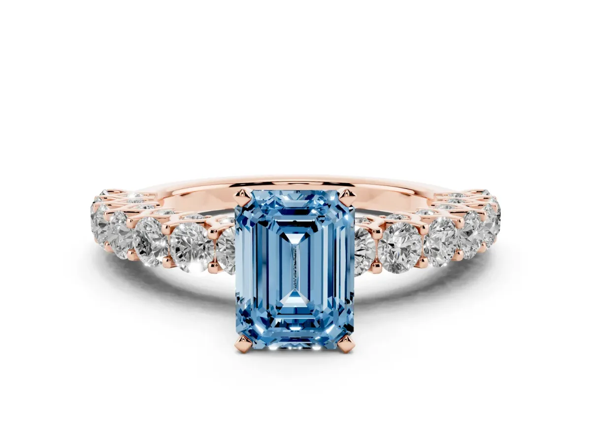 Fancy Blue Emerald Cut Diamond Solitaire Ring with Shared Prong Pavé Band and Four-Prong Setting Rose gold