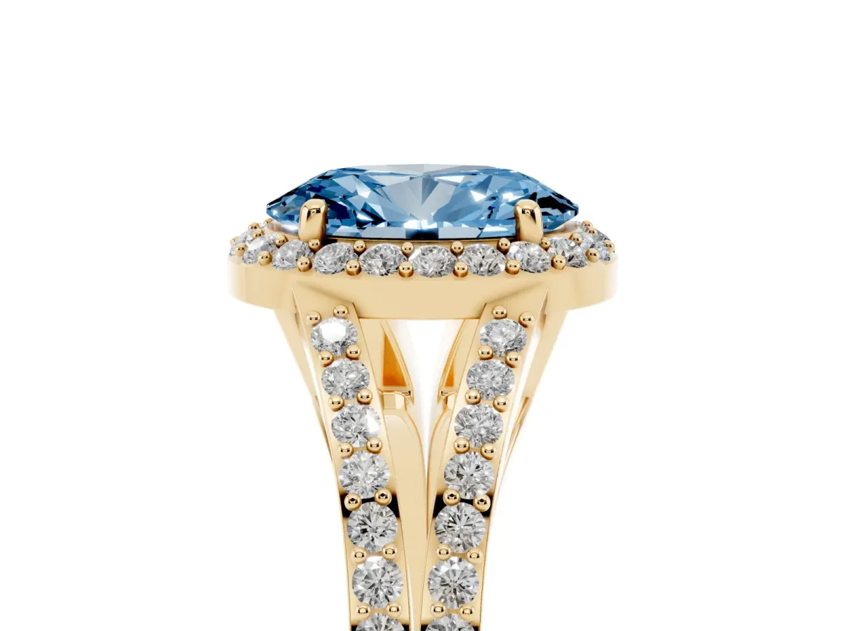 Fancy Blue Oval Cut Halo Split Shank Pave Diamond Ring with Four-Prong Setting Yellow gold