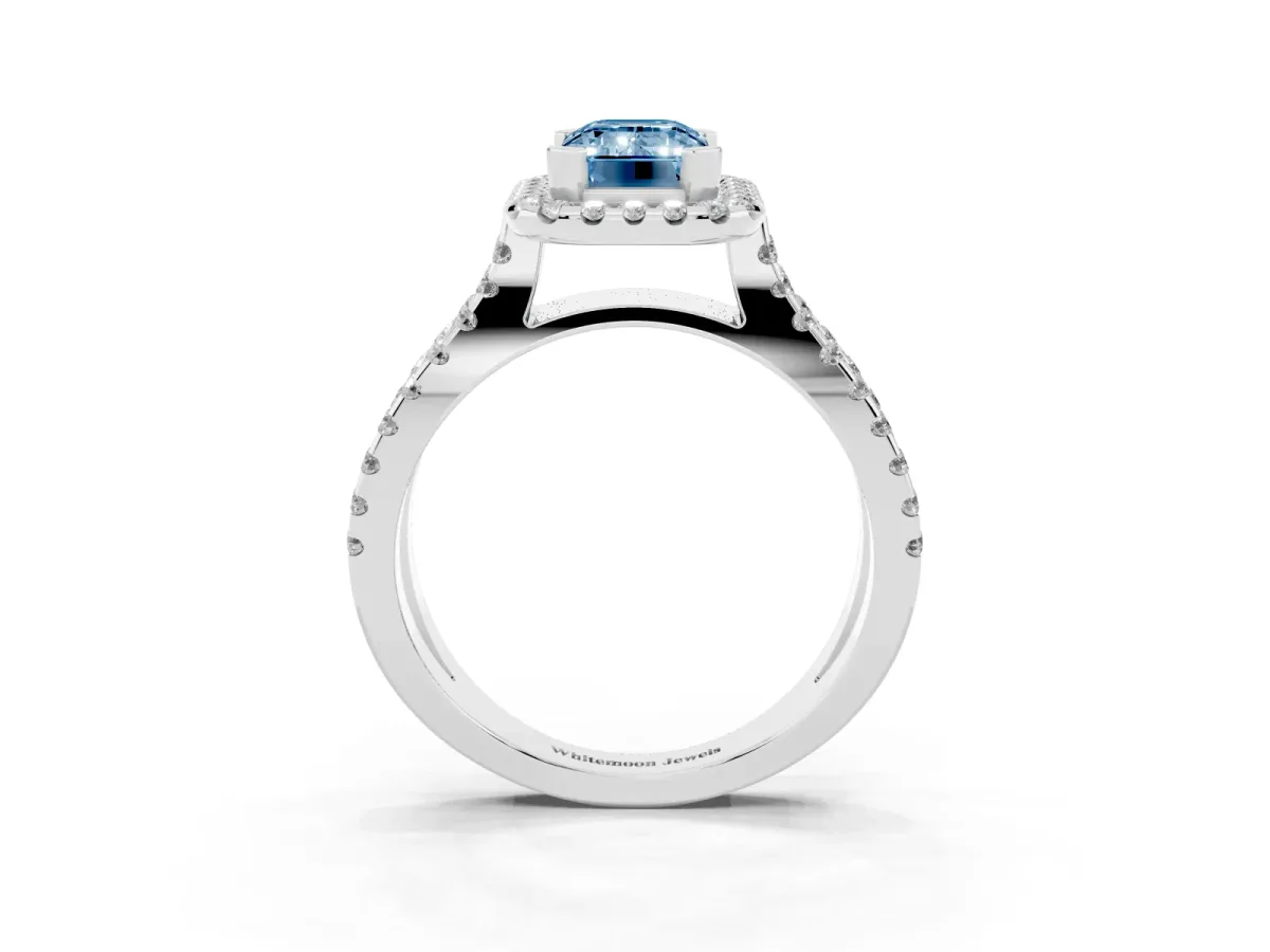 Fancy Blue Emerald Cut Diamond Halo Ring with Split Shank Pavé Band and Prong Setting Silver