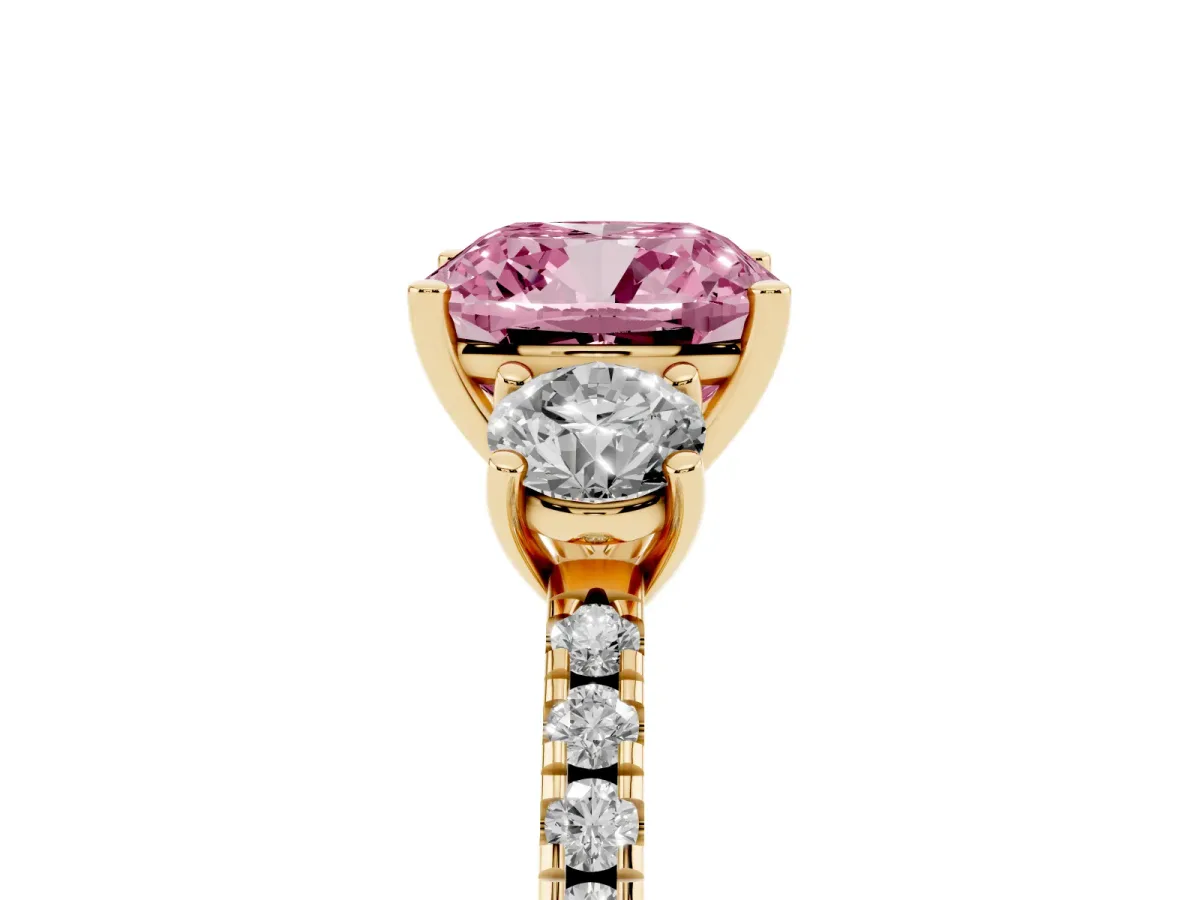Fancy Pink Three-Stone Cushion Cut Cut Diamond Pavé Band with Prong Setting Yellow gold