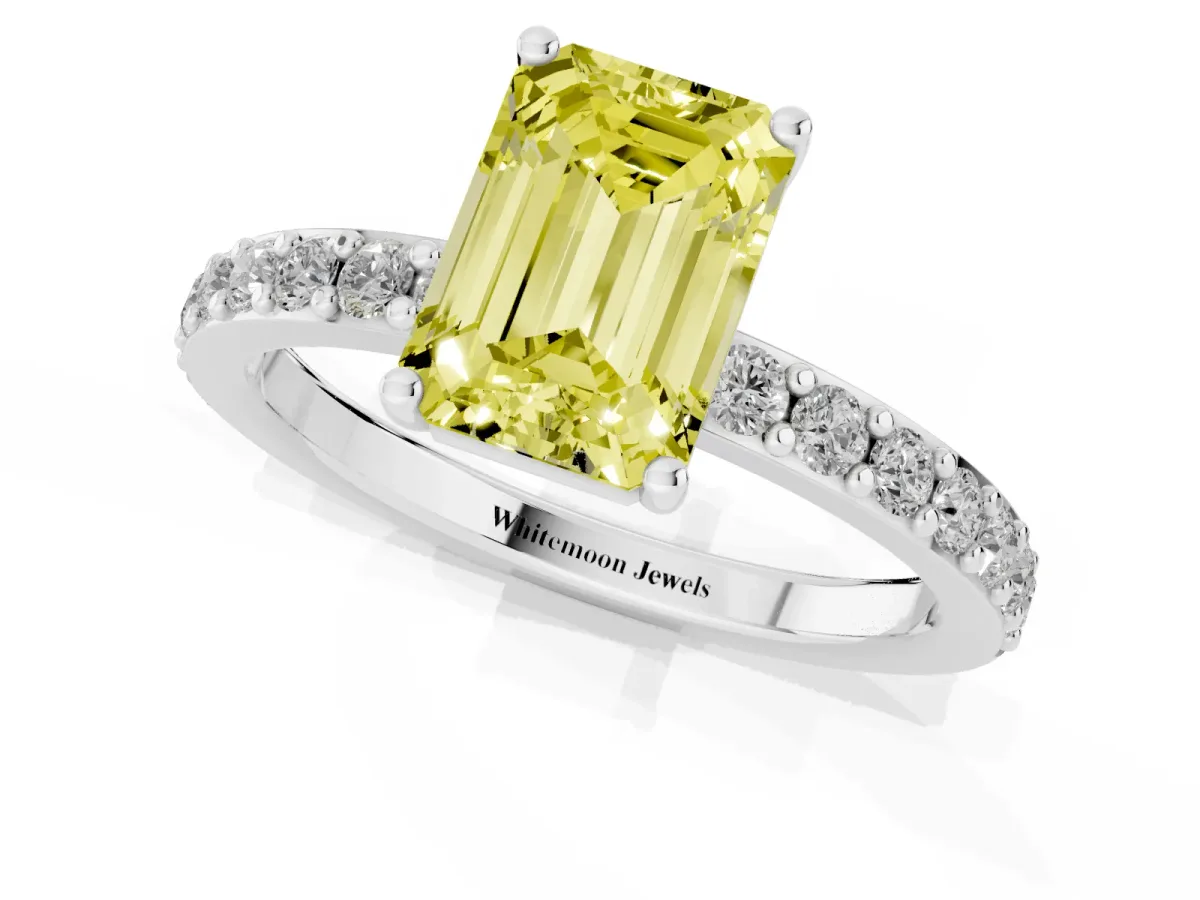 Fancy Yellow Emerald Cut Cut Diamond Solitaire with Pave Band and Four-Prong Setting Silver
