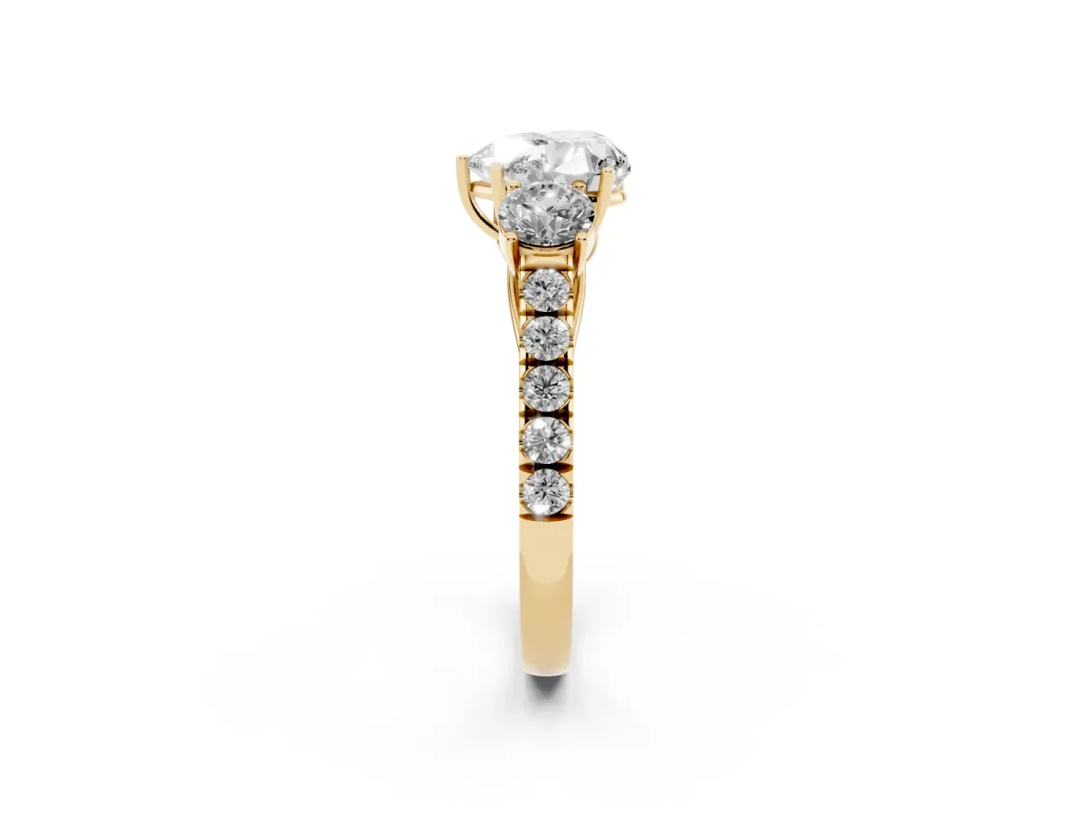 Heart Cut Cut Diamond Three-Stone Ring with Round Side Stones and Pavé Band Yellow gold