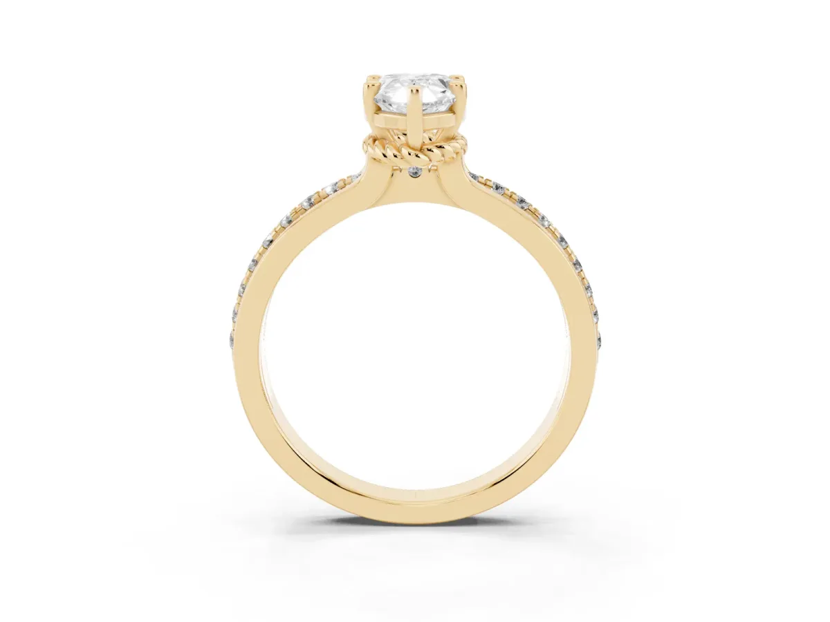 Pear Cut Solitaire Diamond Ring with Channel Set Band and Six-Prong Setting Yellow gold