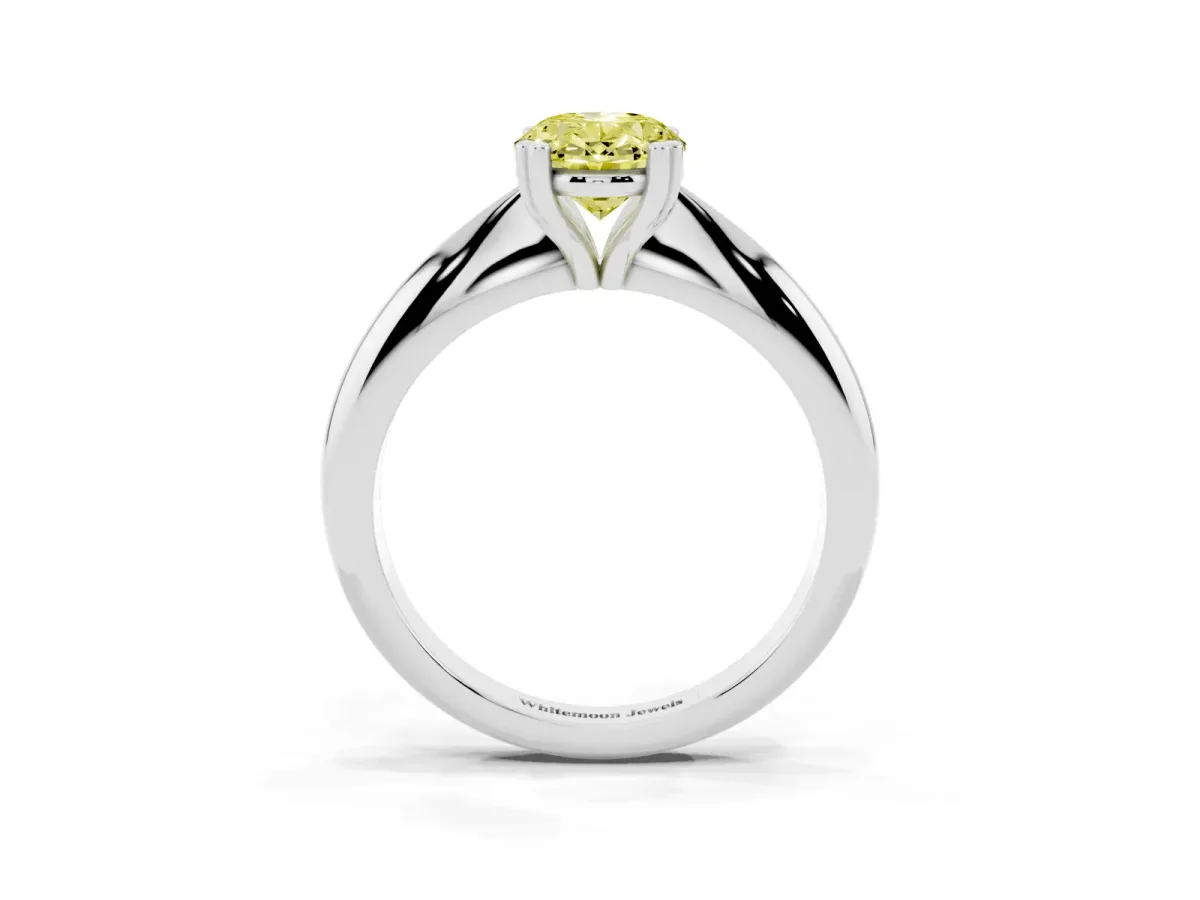 Fancy Yellow Oval Cut Cut Solitaire Engagement Ring with Tapered Band and Four-Prong Setting Silver