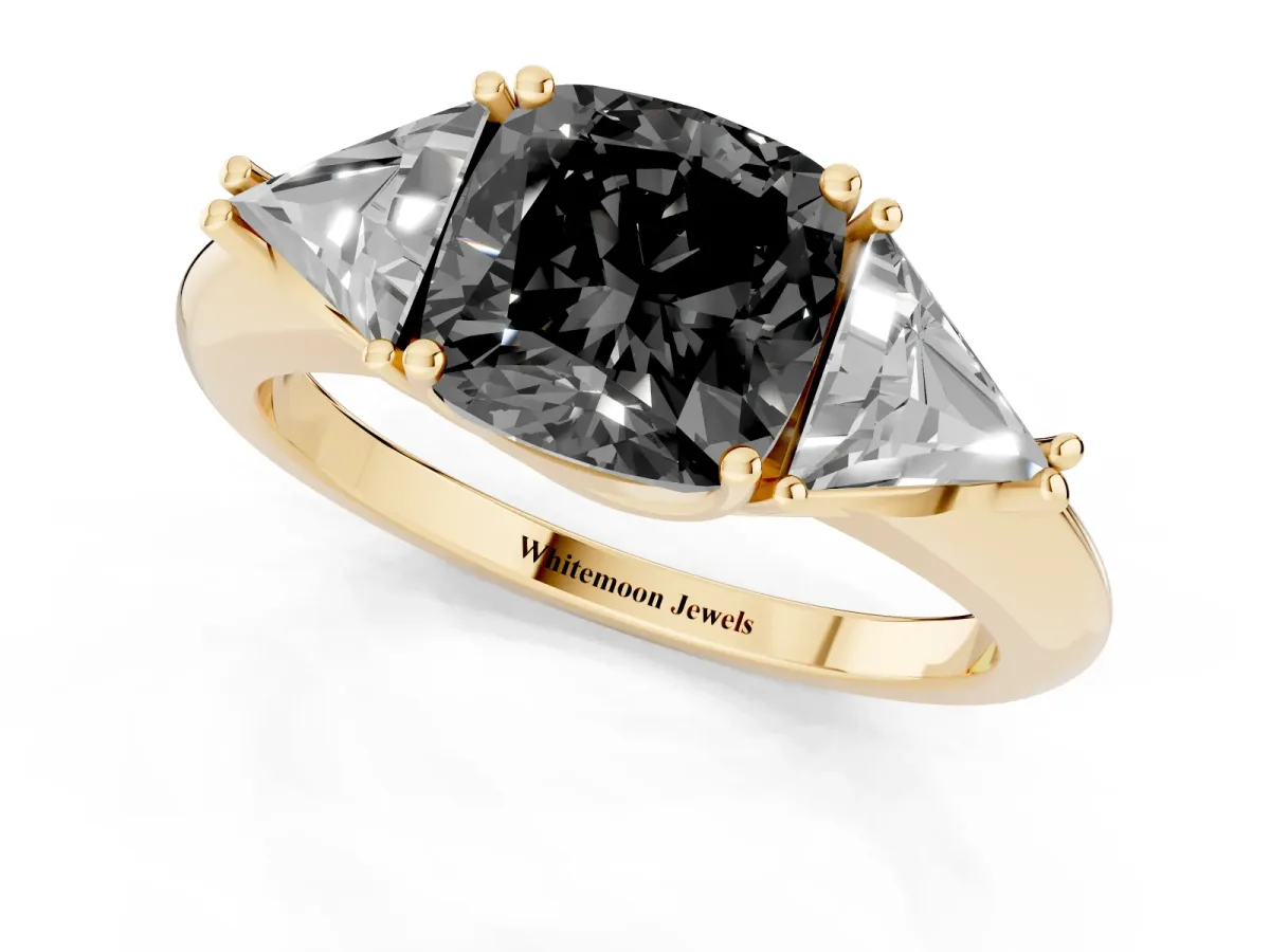 Fancy Black Three-Stone Cushion Cut Diamond Engagement Ring with Trillion Side Stones and Prong Setting Yellow gold