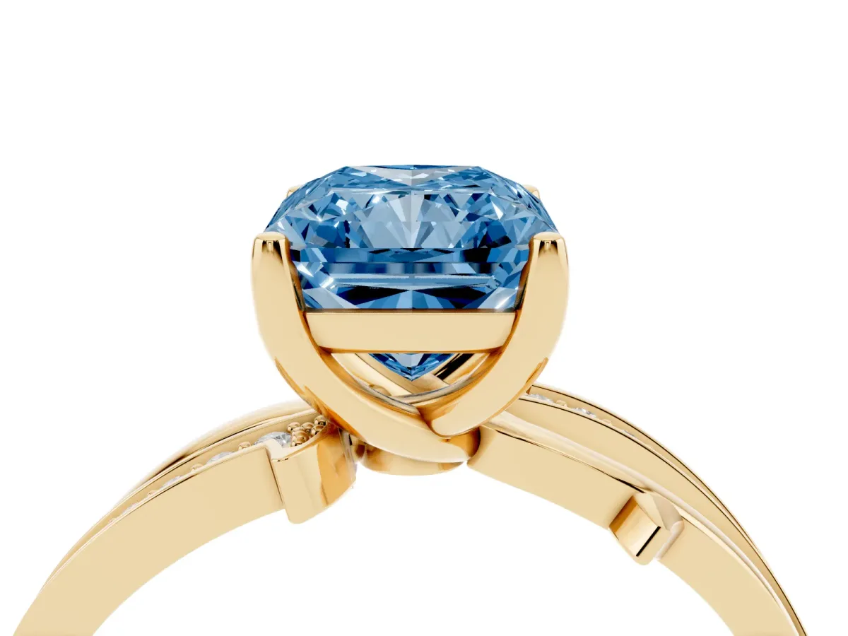 Fancy Blue Radiant Cut Solitaire Twist Band with Pavé Accents and Four-Prong Setting Yellow gold