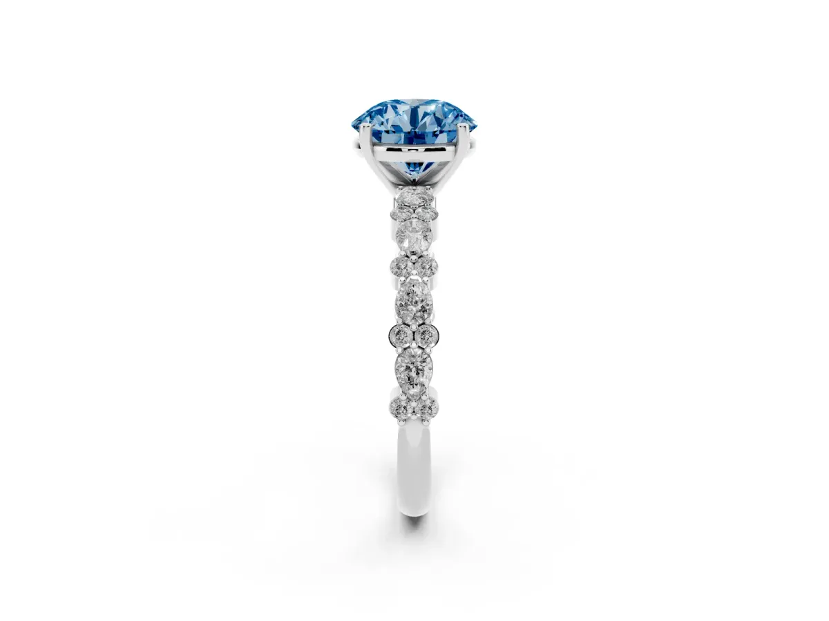Fancy Blue Round Cut Diamond Side Stone Solitaire Ring with Round and Four-Prong Setting Silver