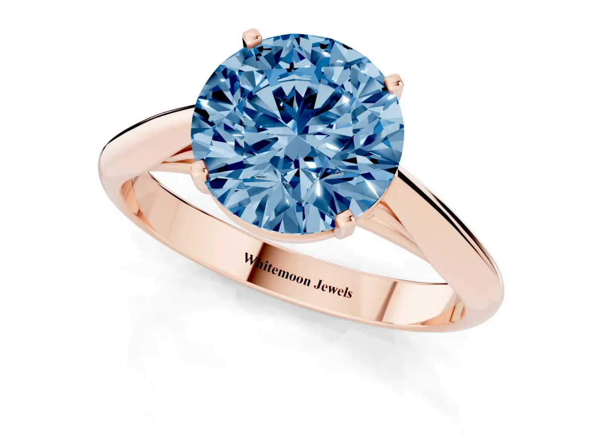 Fancy Blue Round Cut Diamond Solitaire Engagement Ring with Cathedral Setting and Four-Prong Mount Rose gold