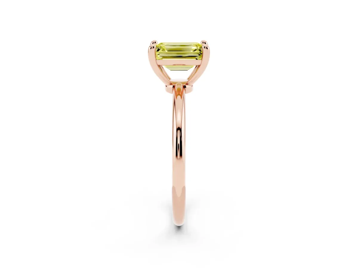 Fancy Yellow Emerald Cut Solitaire Diamond Ring with 4-Prong Setting on a Classic Band Rose gold