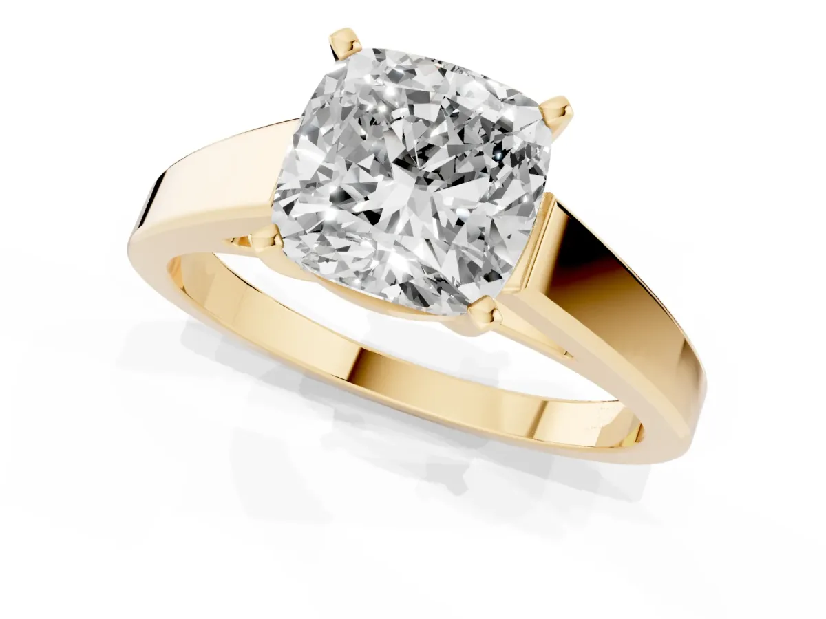 Cushion Cut Solitaire Engagement Ring with Four-Prong Setting and Tapered Band Yellow gold