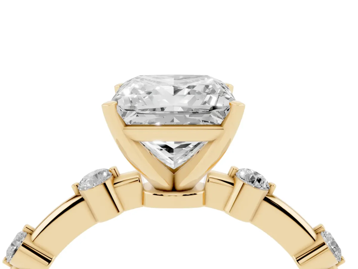 Princess Cut Solitaire Diamond Ring with Bezel Set Side Stones and Prong Setting Yellow gold