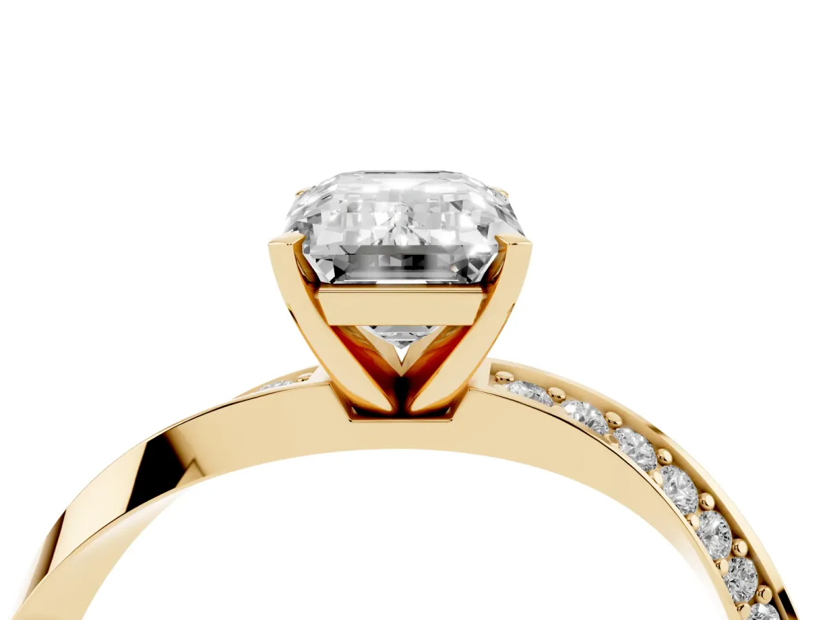 Emerald Cut Diamond Engagement Ring with Side Stone Accents and Four-Prong Setting Yellow gold