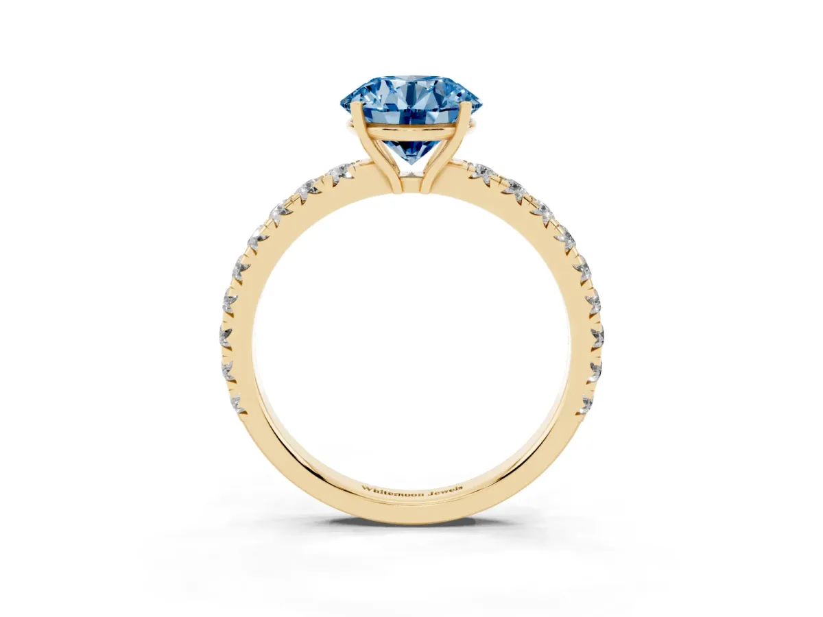 Fancy Blue Round Cut Diamond Pavé Solitaire Engagement Ring with Four-Prong Setting Yellow gold
