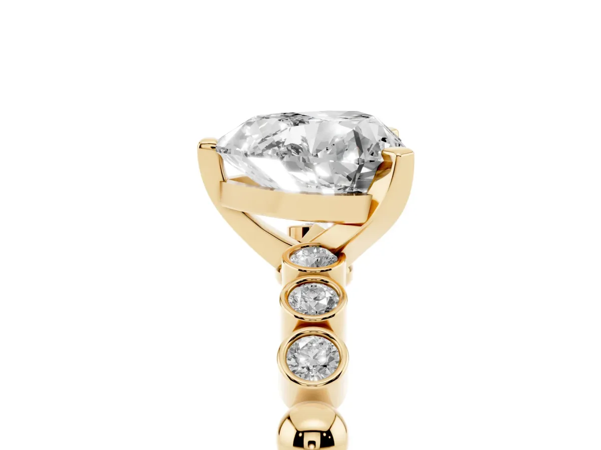 Heart Cut Solitaire Bezel Accent Diamond Engagement Ring with Beaded Band and Four-Prong Setting Yellow gold