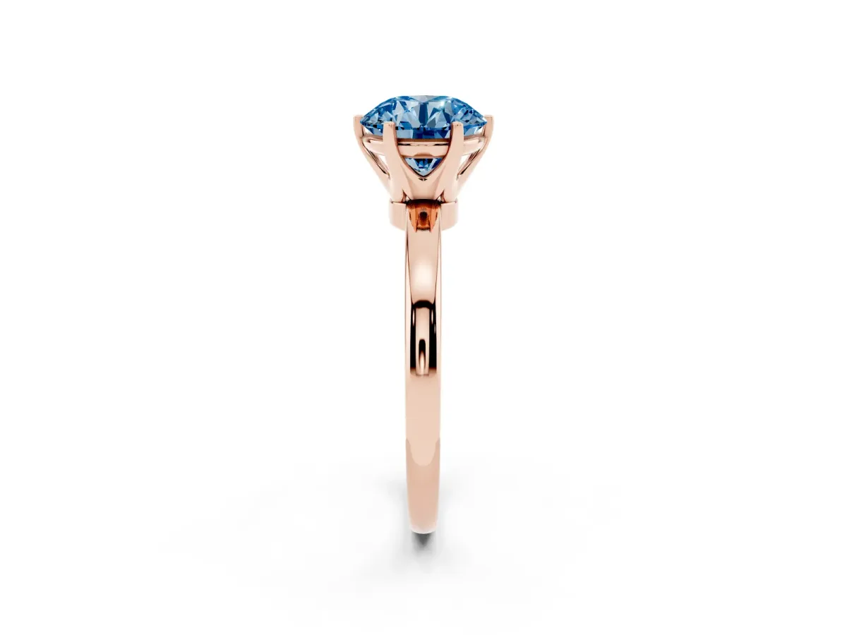Fancy Blue Round Cut Solitaire Diamond Ring with Six-Prong Setting on a Classic Band Rose gold