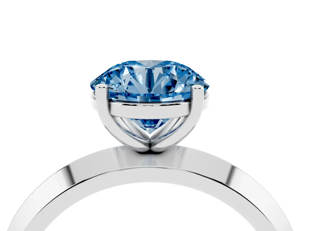 Fancy Blue Round Cut Cut Solitaire Engagement Ring with Flat Band and Four-Prong Setting Silver