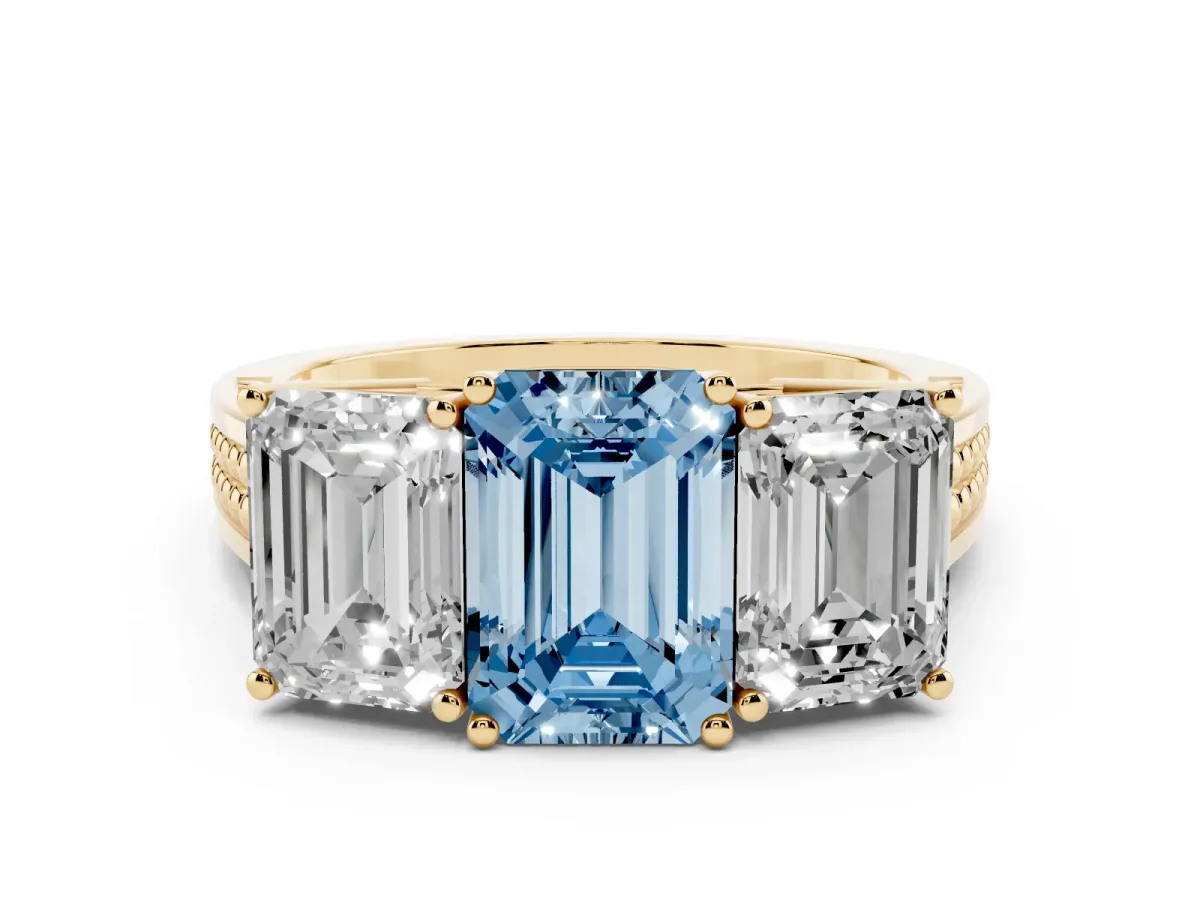 Fancy Blue Emerald Cut Diamond Three-Stone Ring with Prong Setting and Textured Band Yellow gold