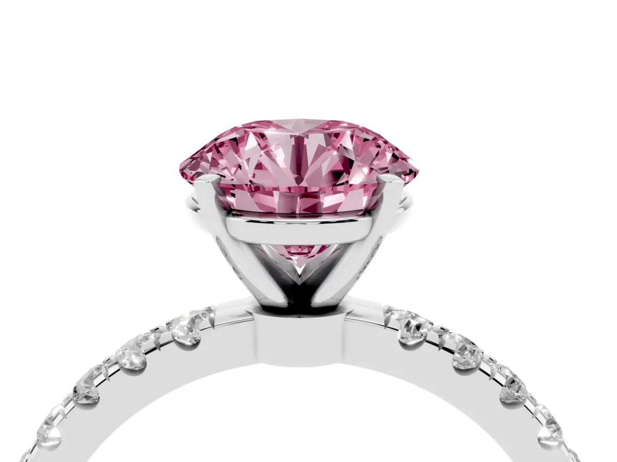 Fancy Pink Round Cut Diamond Solitaire Ring with Pavé Accents and Four-Prong Setting Platinum