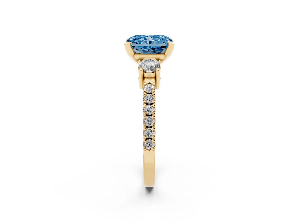Fancy Blue Radiant Cut Three-Stone Diamond Pavé Band with Prong Setting Yellow gold