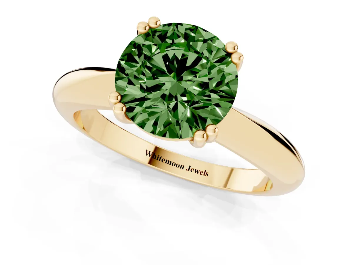 Fancy Green Round Cut Cut Solitaire Engagement Ring with Tapered Band and Four-Prong Setting Yellow gold
