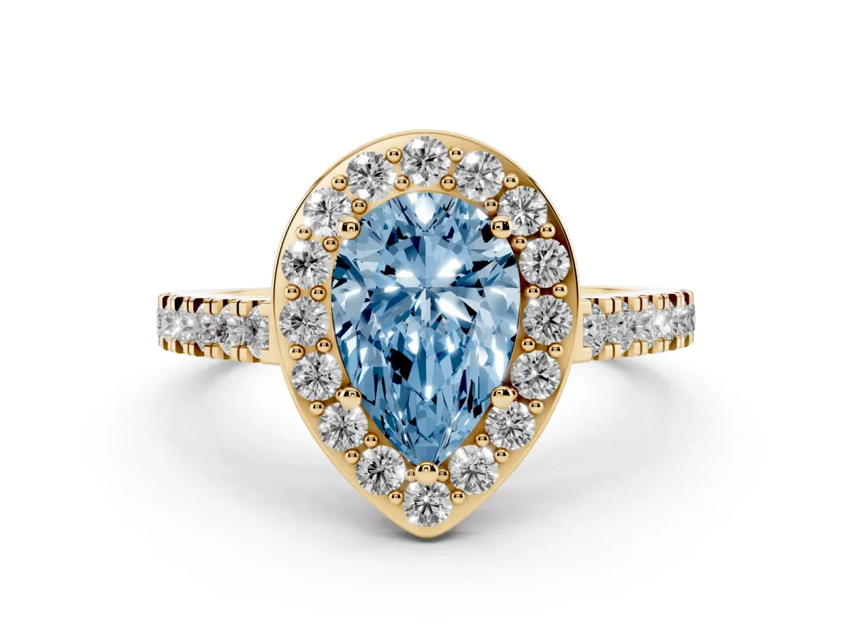 Fancy Blue Pear Cut Diamond Halo Ring with Round Pavé Split Shank and Prong Setting Yellow gold