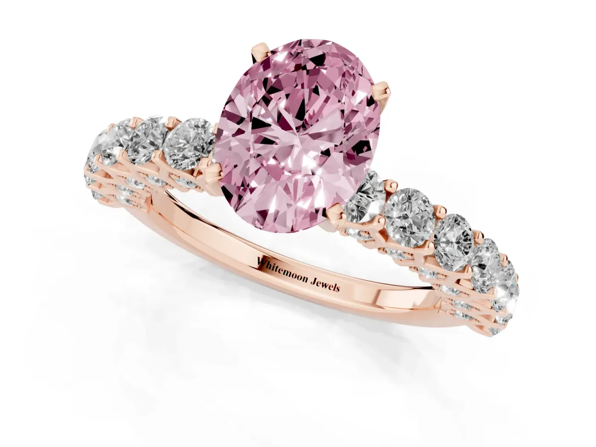 Fancy Pink Oval Cut Diamond Solitaire Ring with Shared Prong Pavé Band and Four-Prong Setting Rose gold