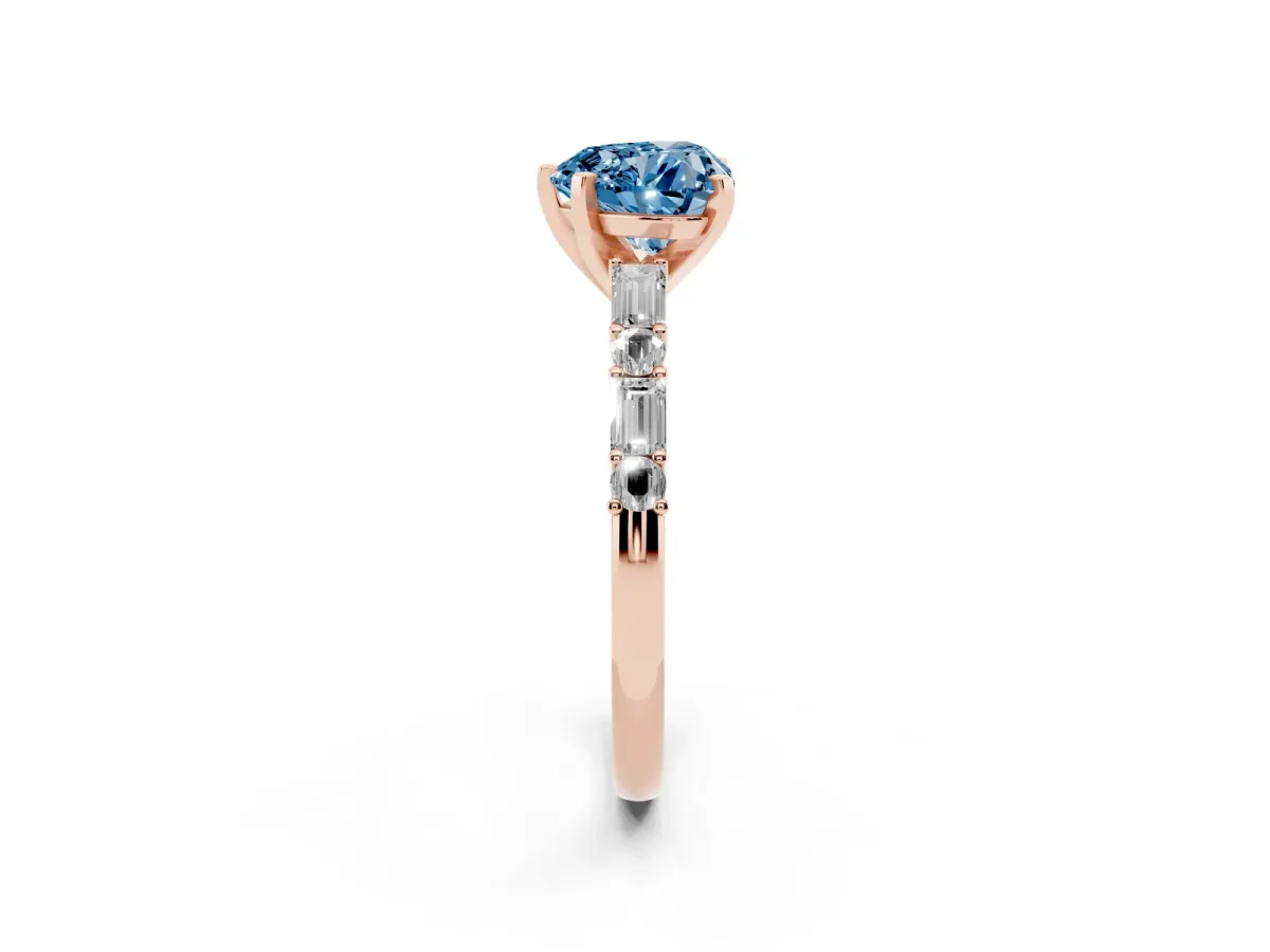Fancy Blue Heart Cut Diamond Solitaire with Side Baguettes and Channel Set Band Rose gold