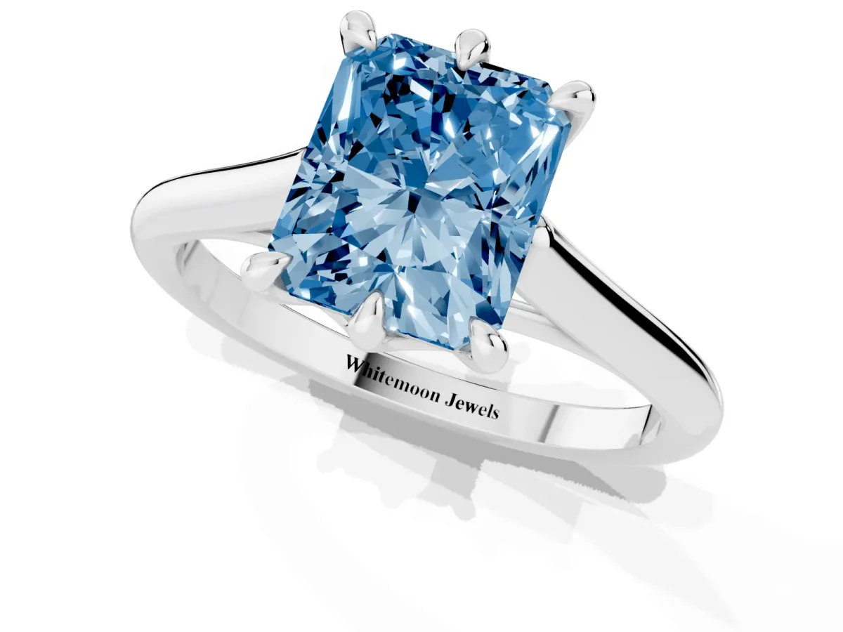 Fancy Blue Radiant Cut Solitaire Engagement Ring with Six-Prong Setting and Classic Band Platinum