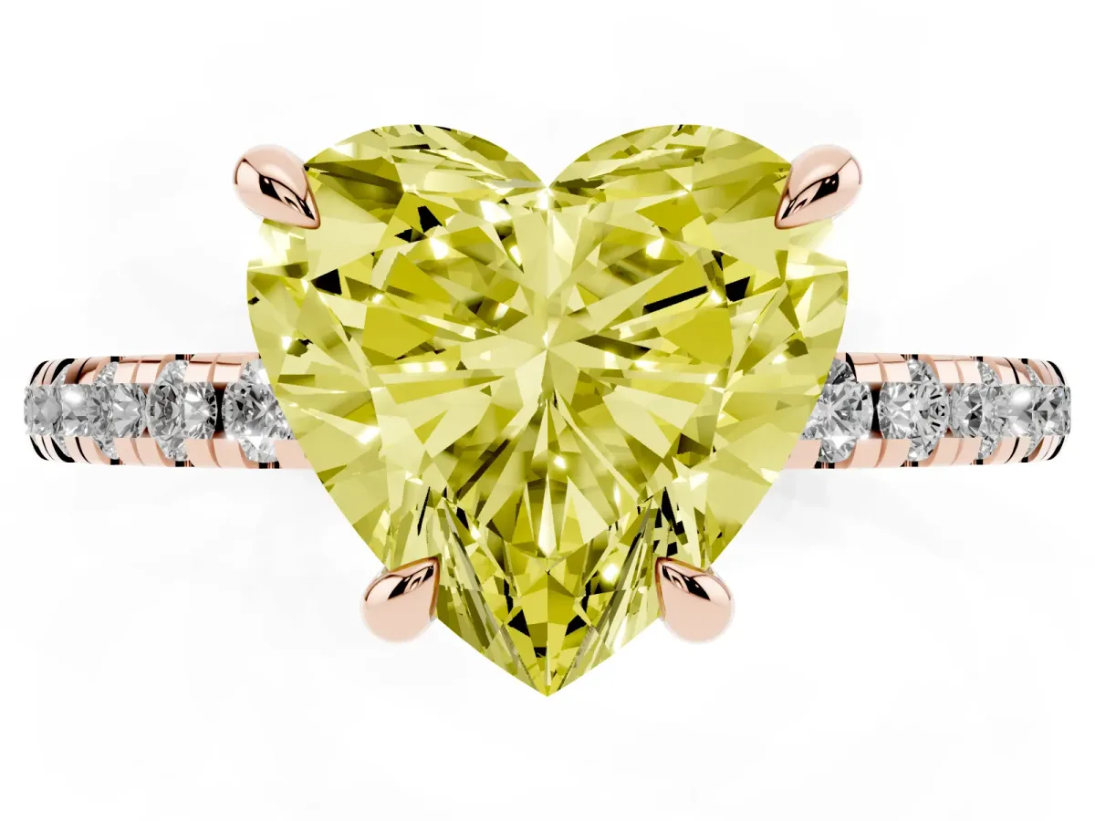 Fancy Yellow Heart Cut Diamond Brilliant Solitaire Ring with Pavé Band and Four-Prong Setting Rose gold